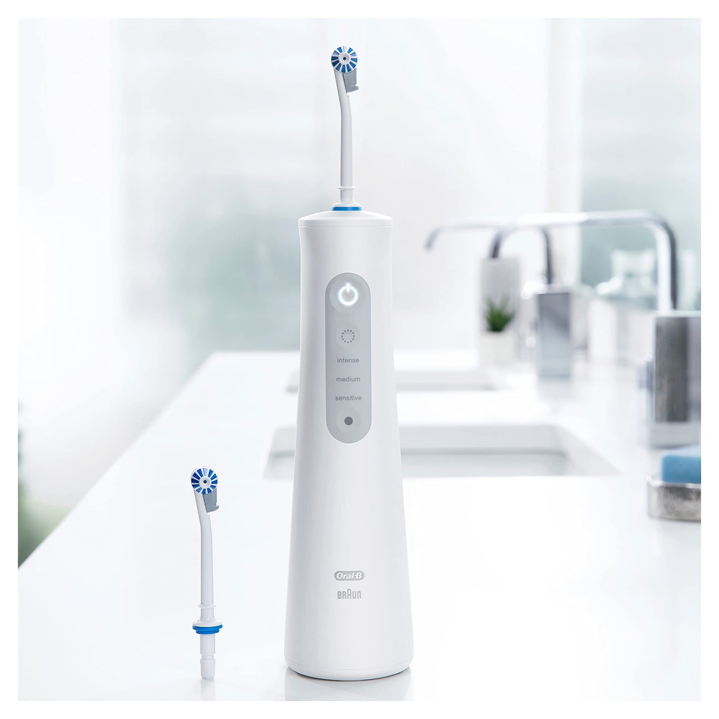 Oral-B AquaCare 6 Pro-Expert oral irrigator, 2 replacement nozzles, interdental cleaner with 6 brushing modes for gentle dental care and healthy gums, designed by brown, white/grey