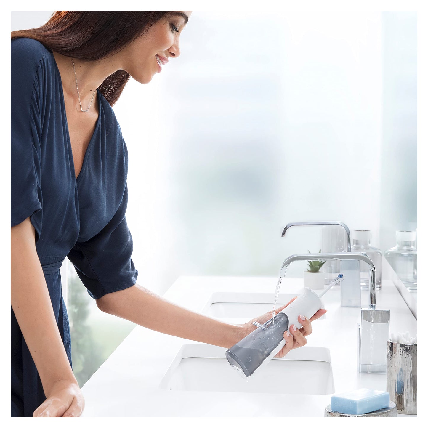 Oral-B AquaCare 6 Pro-Expert oral irrigator, 2 replacement nozzles, interdental cleaner with 6 brushing modes for gentle dental care and healthy gums, designed by brown, white/grey